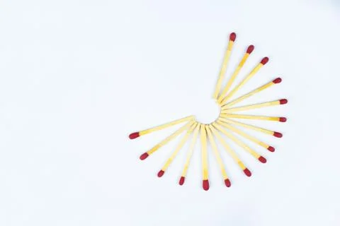 Half circle made with some flammable red fire matches with writable space Stock Photos