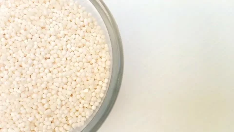 Half of circle shaped Sago pearls or tapioca pearls glass bowl in the left half Video stock 275631333