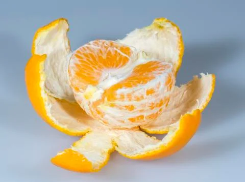 Half Clementine with Peal Stock Photos