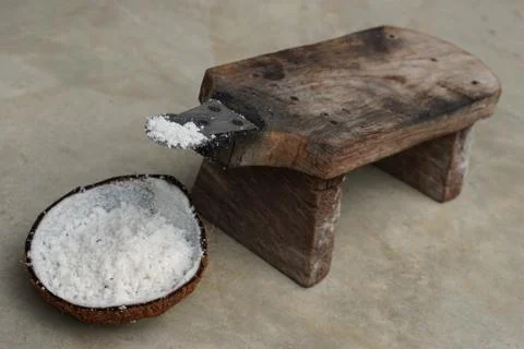 Half of coconut shell with coconut grater Stock Photos