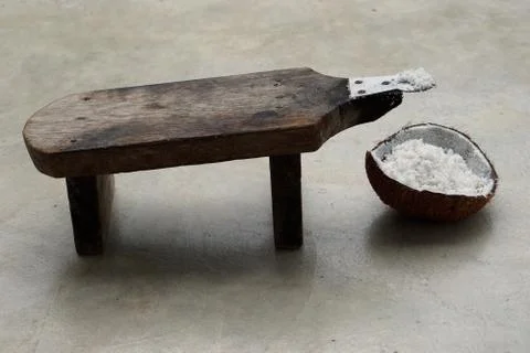 Half of coconut shell with coconut grater Stock Photos