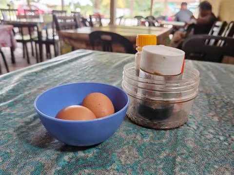 Half-Cooked Egg Breakfast Served at a Restaurant Stock Photos