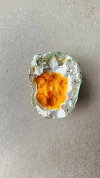 Half a cooked salted egg Stock Photos