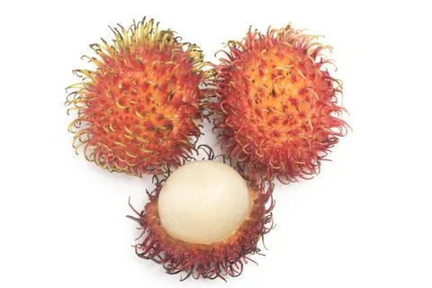 Half cut and two fresh organic rambutan delicious fruit isolated on white b.. Stock Photos
