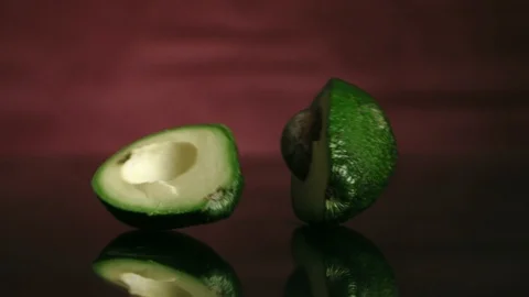 A half-cut avocado Stock Footage 102708795