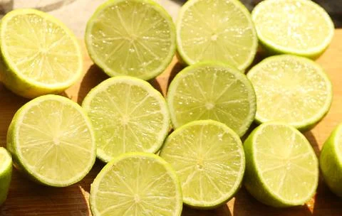 Half cut limes background close up photo Stock Photos