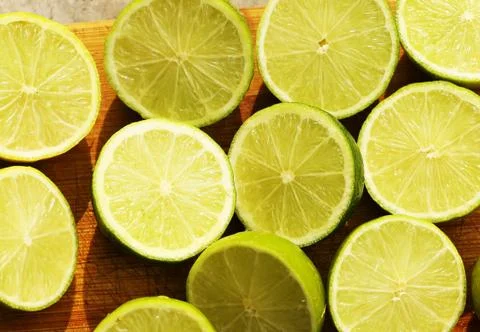 Half cut limes background close up photo Stock Photos