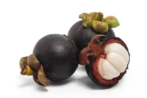 Half cut sliced and two whole fresh organic mangosteen delicious fruit isol.. Stock Photos