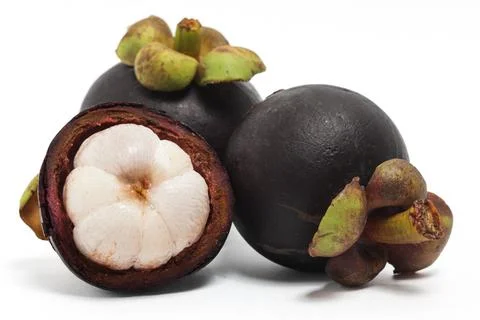 Half cut sliced and two whole fresh organic mangosteen delicious fruit isol.. Stock Photos