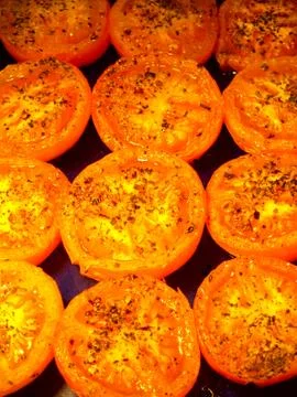 Half Cut Tomatoes in a Serving Dish Stock Photos