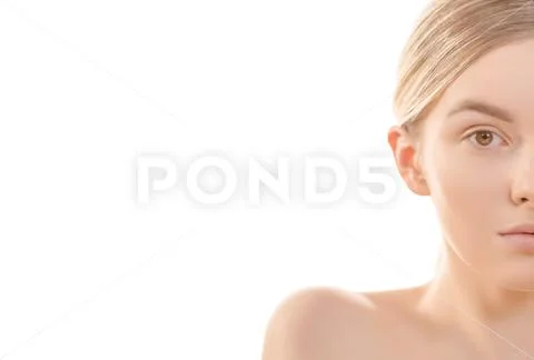 The half of the cute woman face on the white background Stock Photos
