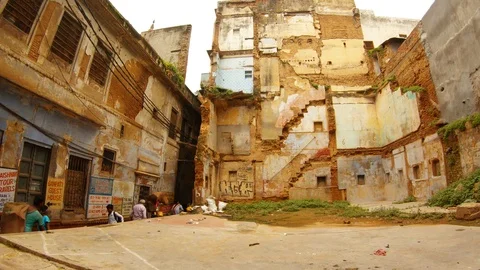 Half destroyd many-storied building in center of Benares Stock Footage 99007314