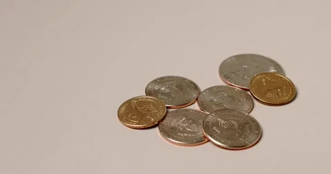 Half Dollar coins on bright surface. US Dollar currency Stock Footage 172174954