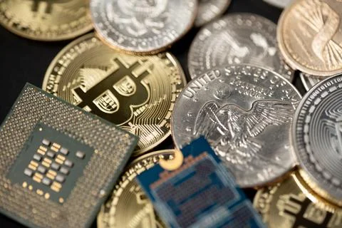 Half dollar next to microchip and gold Bitcoin coin. Computing power 스톡 사진