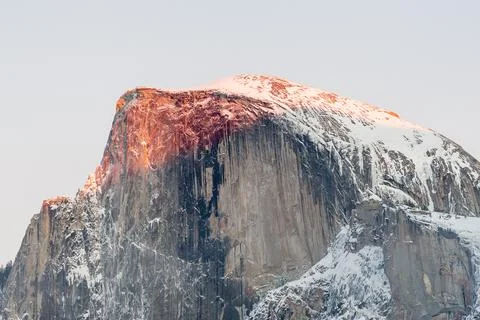 Half dome illuminated by the setting sun Stock Photos