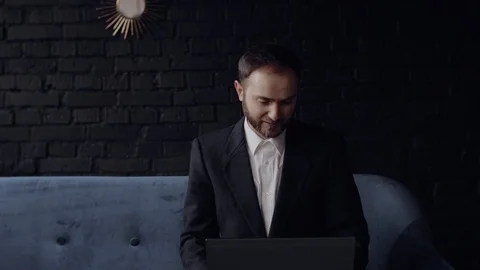 Half dressed man wearing suit coat and panties on video conference. Work from Stock Footage 128328779