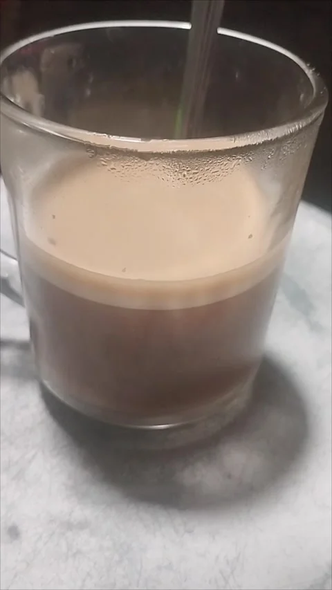 Half-Drunk Coffee Latte – A Moment of Pause Stock Footage 295978056