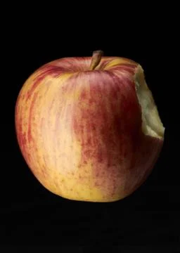 Half eaten apple Stock Photos