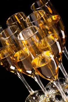 Half empty glasses of champagne Stock Photos