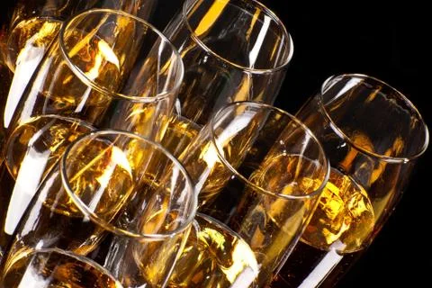 Half empty glasses of champagne Stock Photos