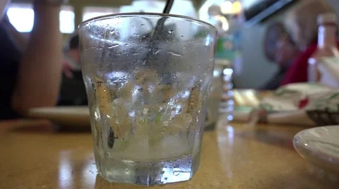 Half Empty Rocks Glass In Restaurant Stock Footage 47237126