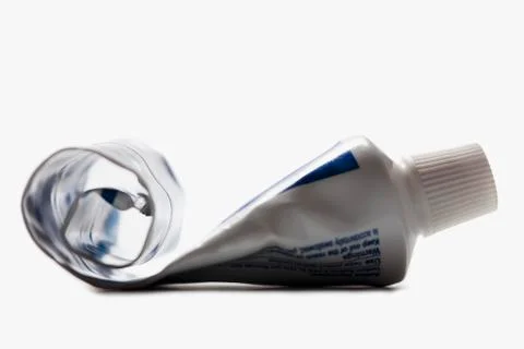 Half empty toothpaste tube Stock Photos