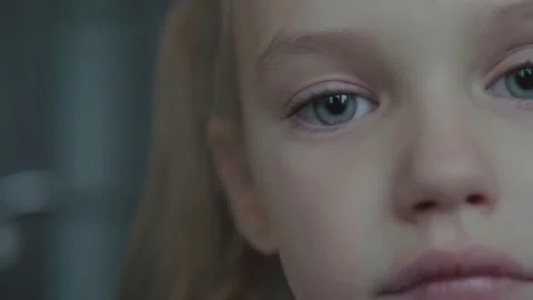 Half Face. Girl's Blinking Big Blue Sad ... | Stock Video | Pond5