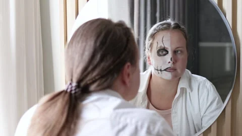Half face makeup on halloween. Video stock 290487159