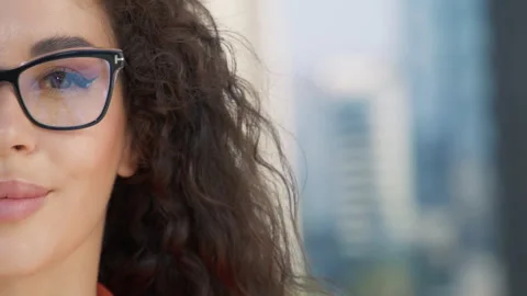 Half face portrait of beautiful mixed race gorgeous woman in fashion eyeglasses Stockbeeldmateriaal 253583761