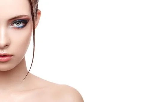 Half-face portrait of beautiful sensitive woman with fresh clean skin, wet ef Stock Photos
