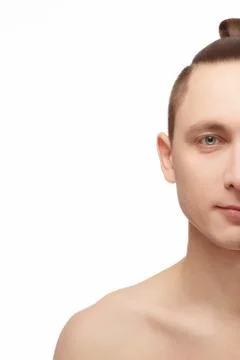 Half face of young man Stock Photos