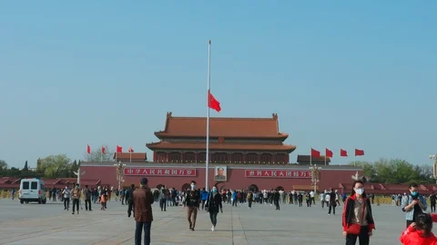 Half flag  tiananmen square During Covid-19 china beijing Stock Footage 130084636