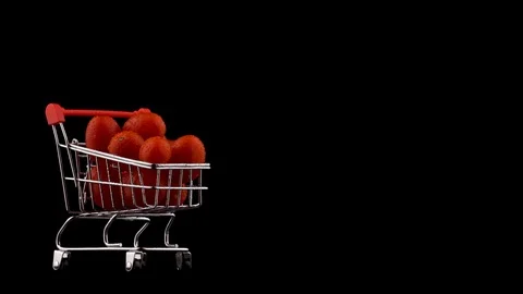 Half frame. Macro shooting of shopping cart packed with red cherry tomatoes pile Stock Footage 99330712