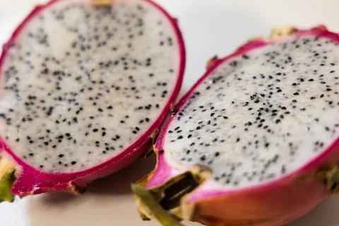 Half of fresh dragon fruit with half and pitaya Stock Photos