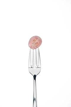 Half fresh grape berry fork Stock Photos