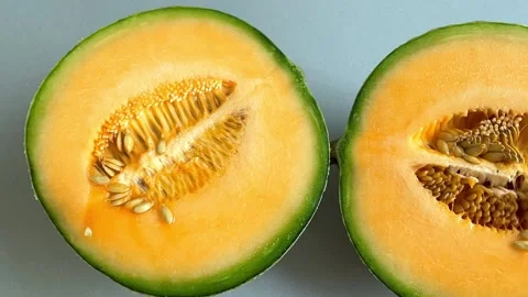 A half fresh melon was cut for show inside of it, consist a lot of seed. Stock Footage 161041207