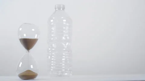 Half Full Sand Timer with Plastic Bottle Stock Footage 147851824