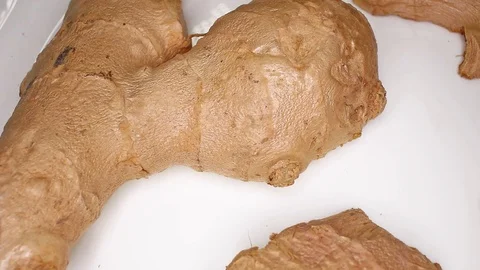 Half Ginger Gingers Closeup Texture on Rotating Plate Stock Footage 113199331