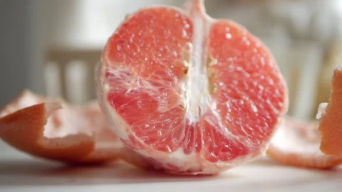 The half grapefruit is peeled Stock-Footage 151394986
