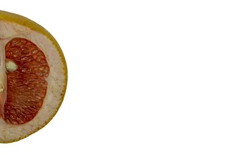 Half grapefruit on a white background isolate copy space Stock Photos