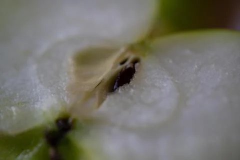 Half green apple close up Stock Photos
