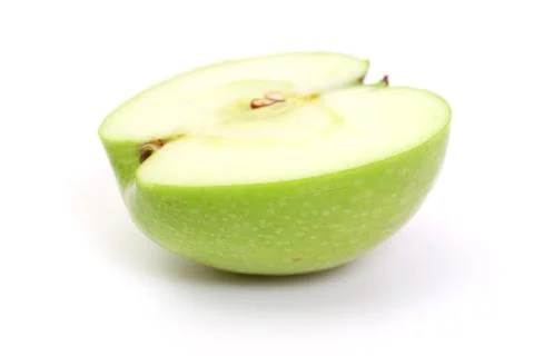 Half green apple Stock Photos
