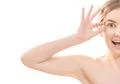The half of the happy woman face on the white background Photo