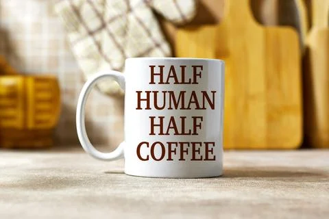 Half human half coffee on cup in the kitchen Stock Photos