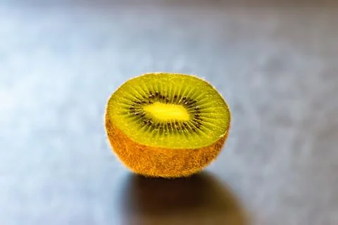 Half Kiwi on the table Stock Photos