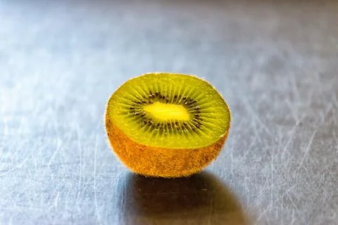 Half Kiwi on the table Stock Photos