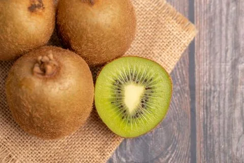 A half of kiwi on the table Stock Photos
