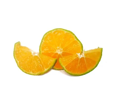 Half lemon and slice isolated on white background. orange peel is green Stock Photos