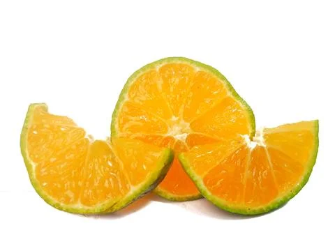 Half lemon and slice isolated on white background. orange peel is green Stock Photos