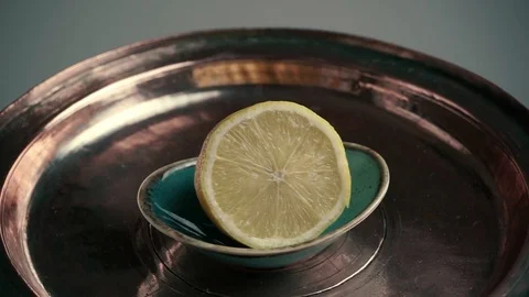 Half lemon citrus fruit on tray background Video stock 106531730